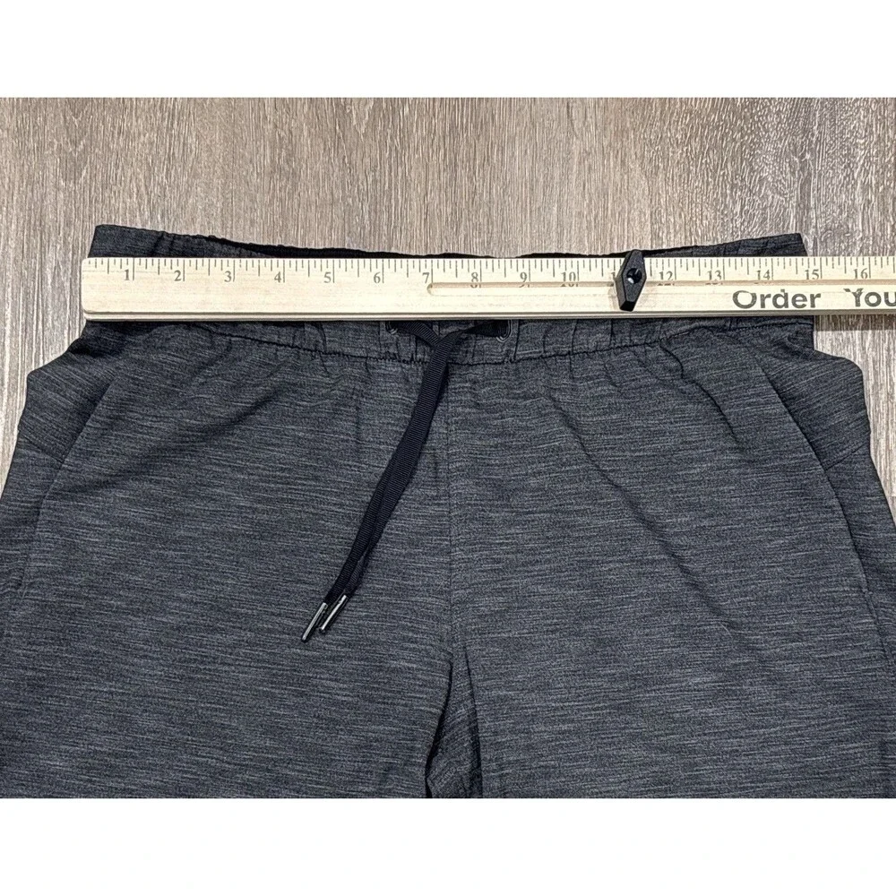 Lululemon On The Fly Pant Womens 6 Gray Heathered Black Pockets